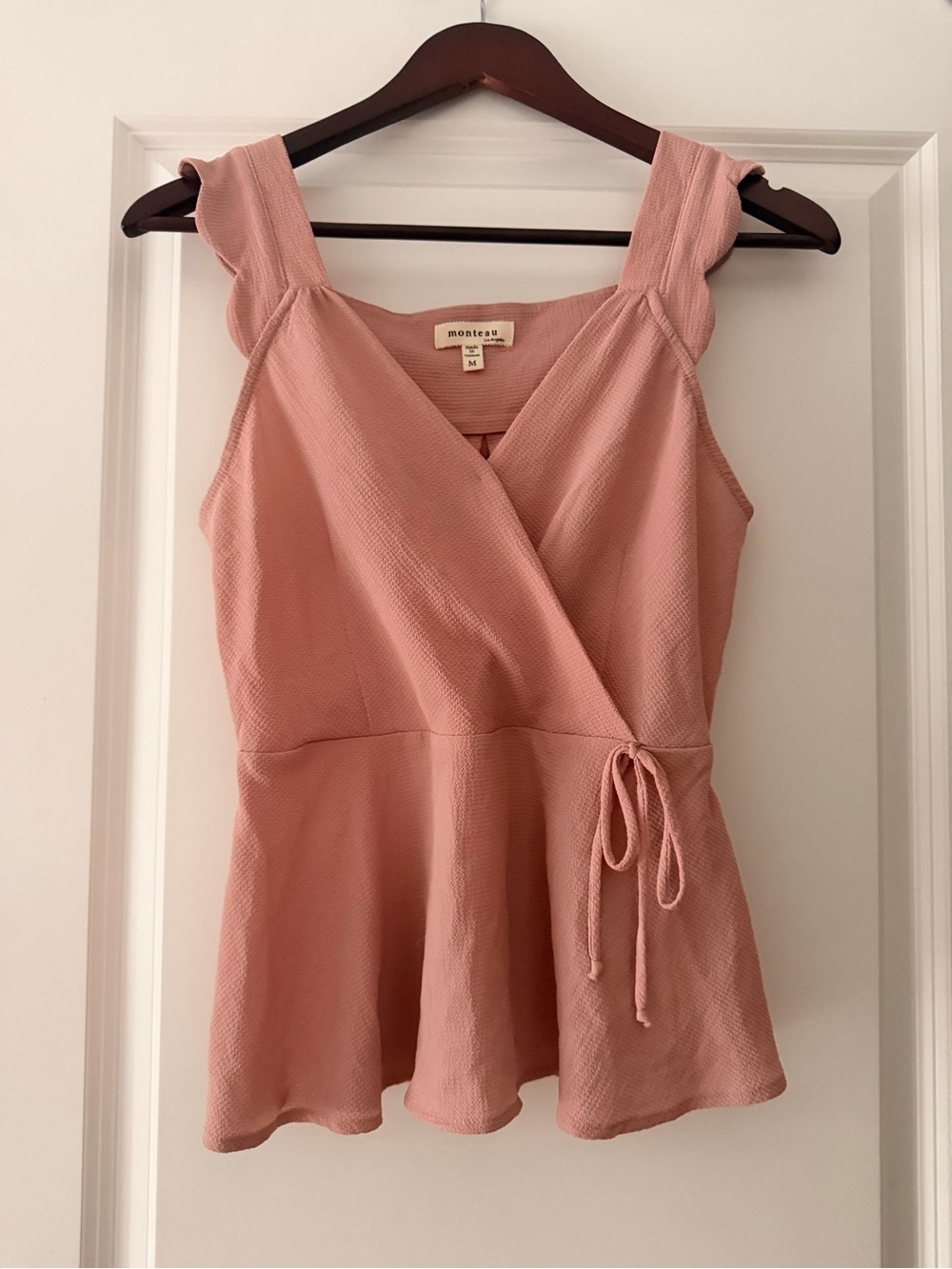 Blush Pink Sleeveless Peplum Top